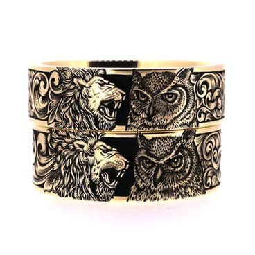 Hand engraved lion and owl matching wedding rings
