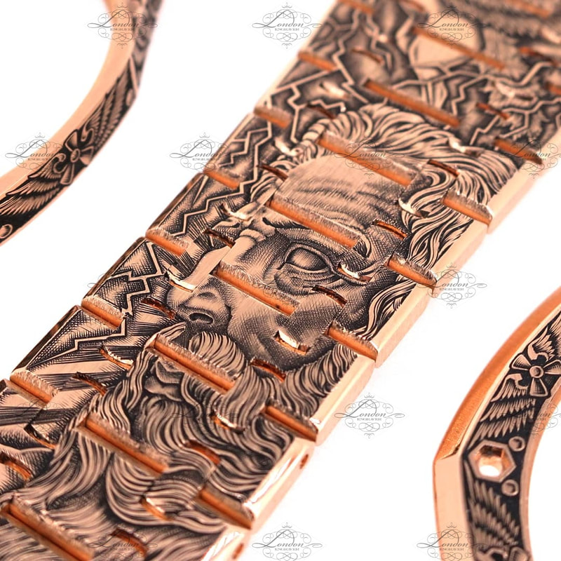 18ct rose gold Audemars Piguet watch strap engraved with the face of Zeus